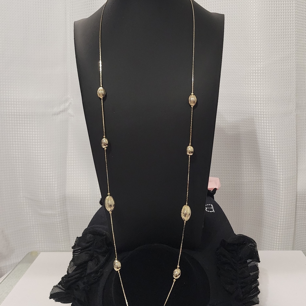 Elegant Gold Necklace with Beaded Accents